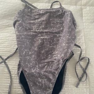 JOLYN GAVIN TIE BACK GREY MARBLE ONESIE